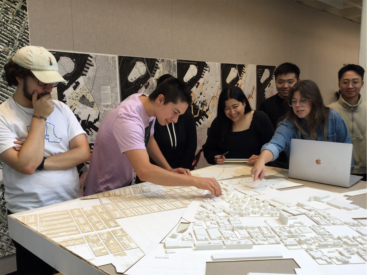 Hyper REAL - students and faculty around physical model of site