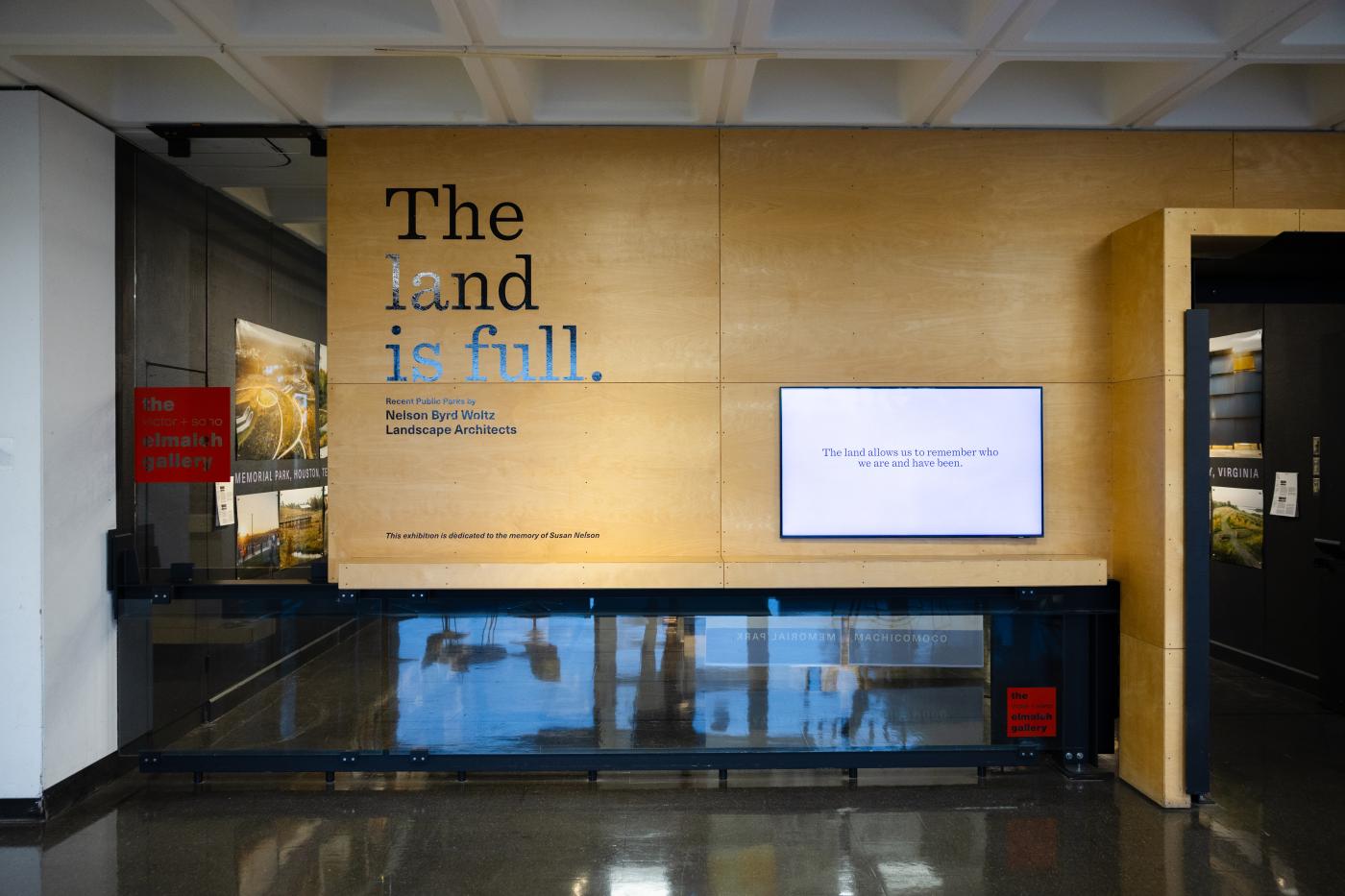 Photo of the outside of Elmaleh Gallery showing the title The Land is Full