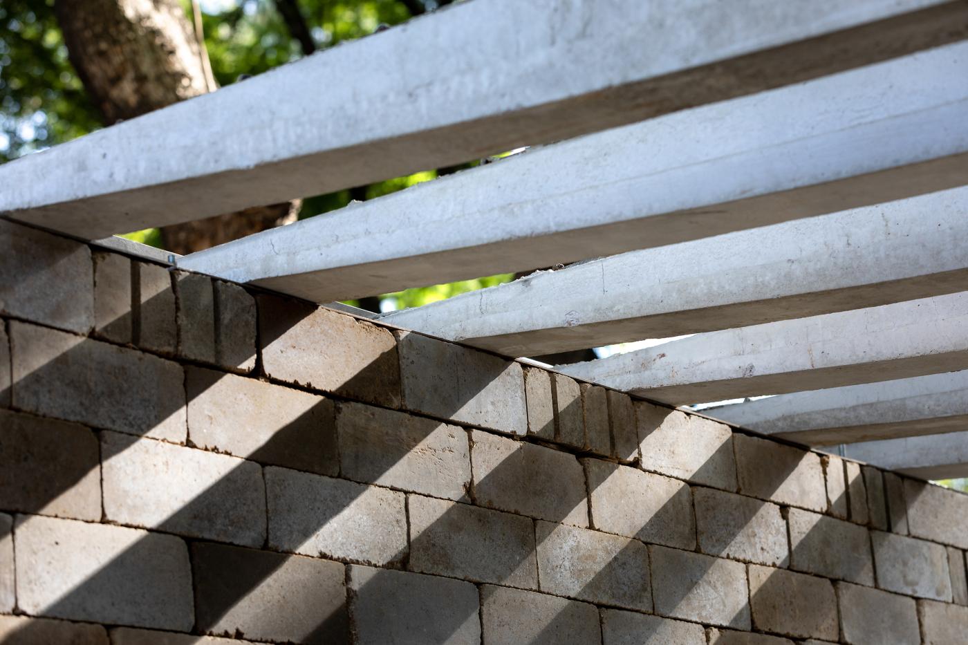 Roof construct made of precast concrete with sunlight coming through