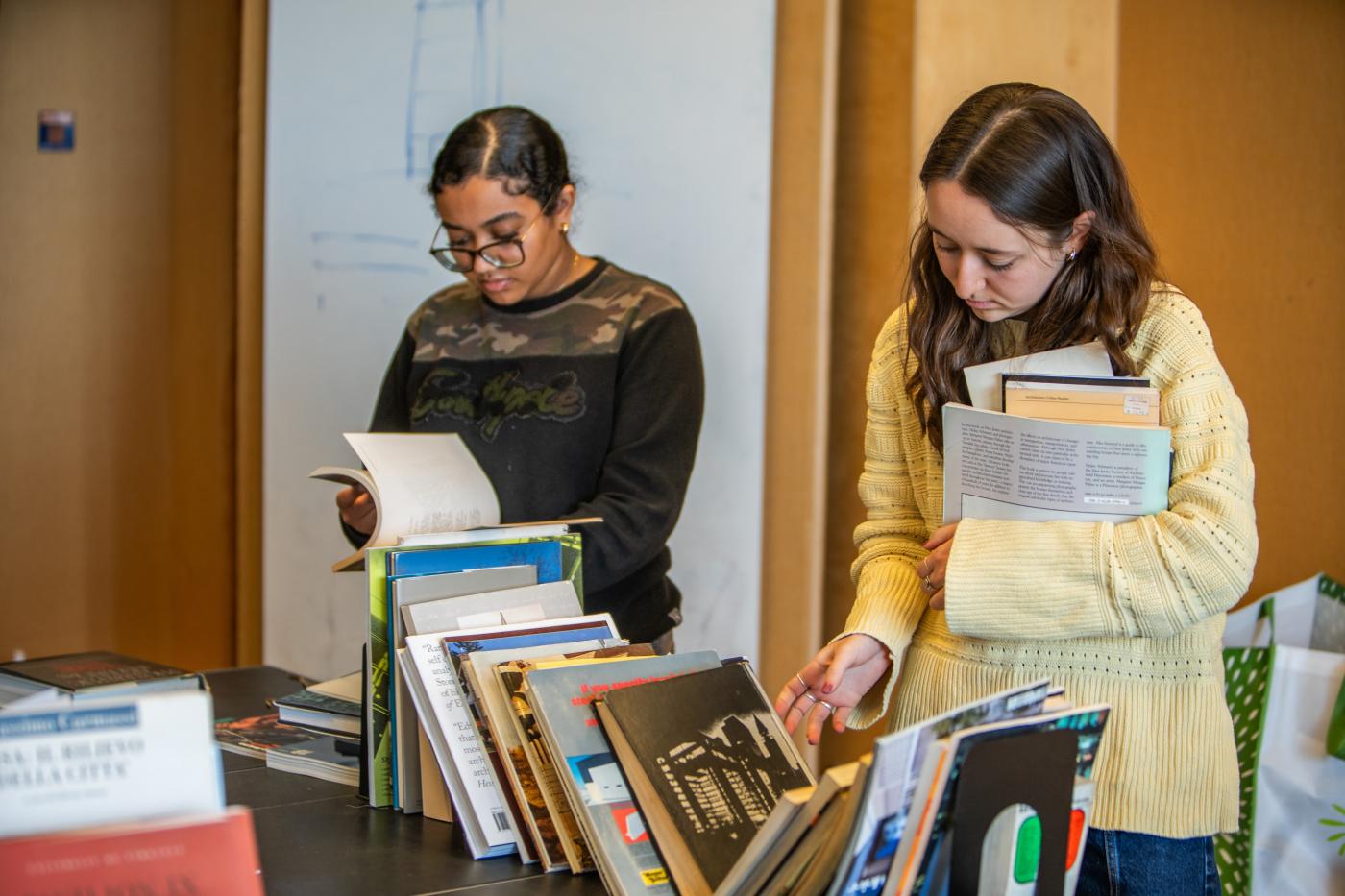 SAH UVA two students looking at books