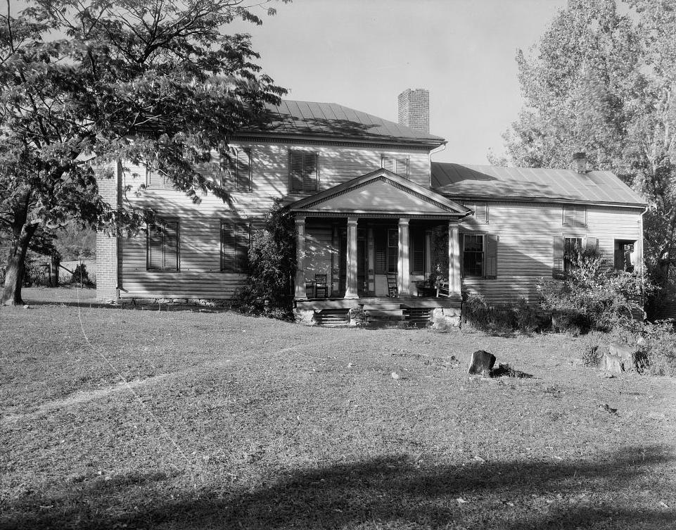 Historic black and white photo by Frances Benjamin Johnston of a burned home in Brown's Cove, Virginia.
